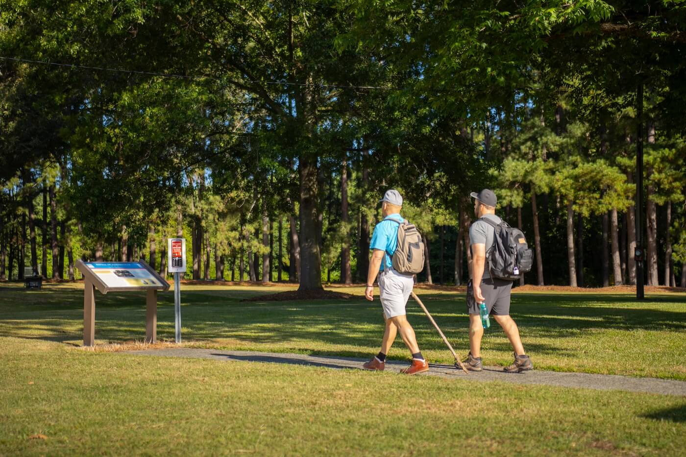 home-hero Two men walking on a trail