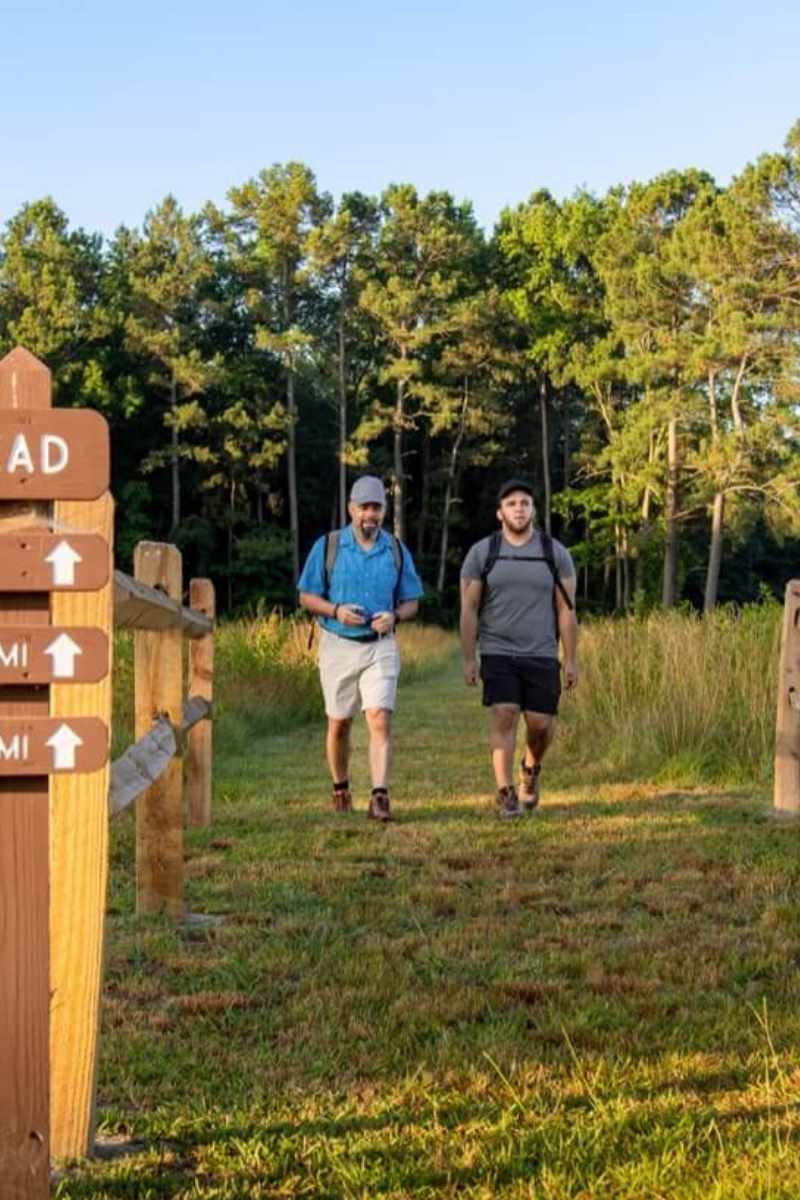 home-walking Two men walking down a Civil War trail