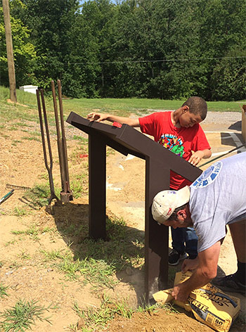 installation-w-teen civil war reenactors.