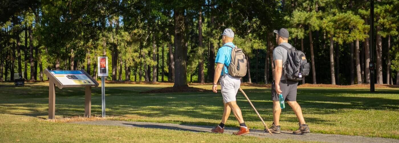 Two men walking the trail