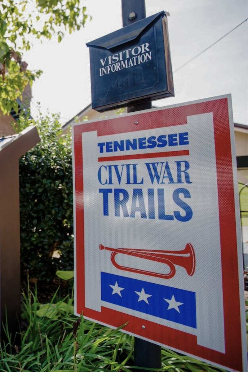 home-partner Two men walking down a Civil War trail
